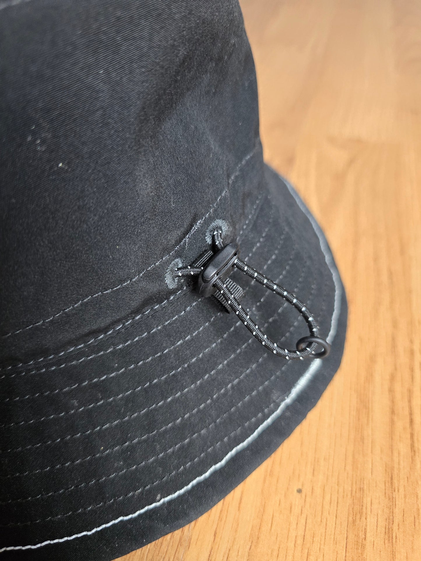 And Wander Logo Print 3M Reflective Bucket Hat