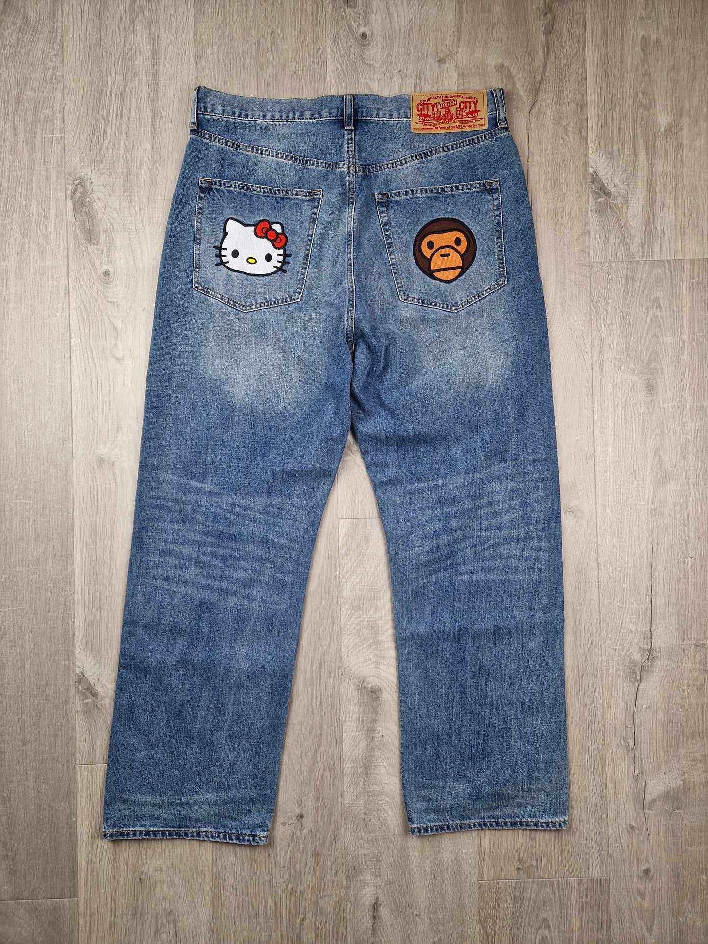 SuperRARE Bape x Sanrio Hello Kitty x Baby milo jeans (34×34)