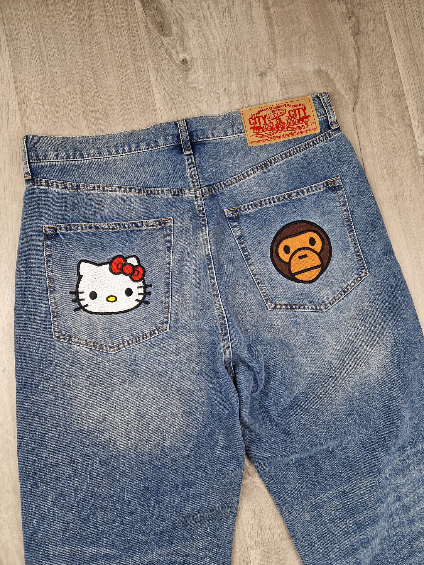 SuperRARE Bape x Sanrio Hello Kitty x Baby milo jeans (34×34)