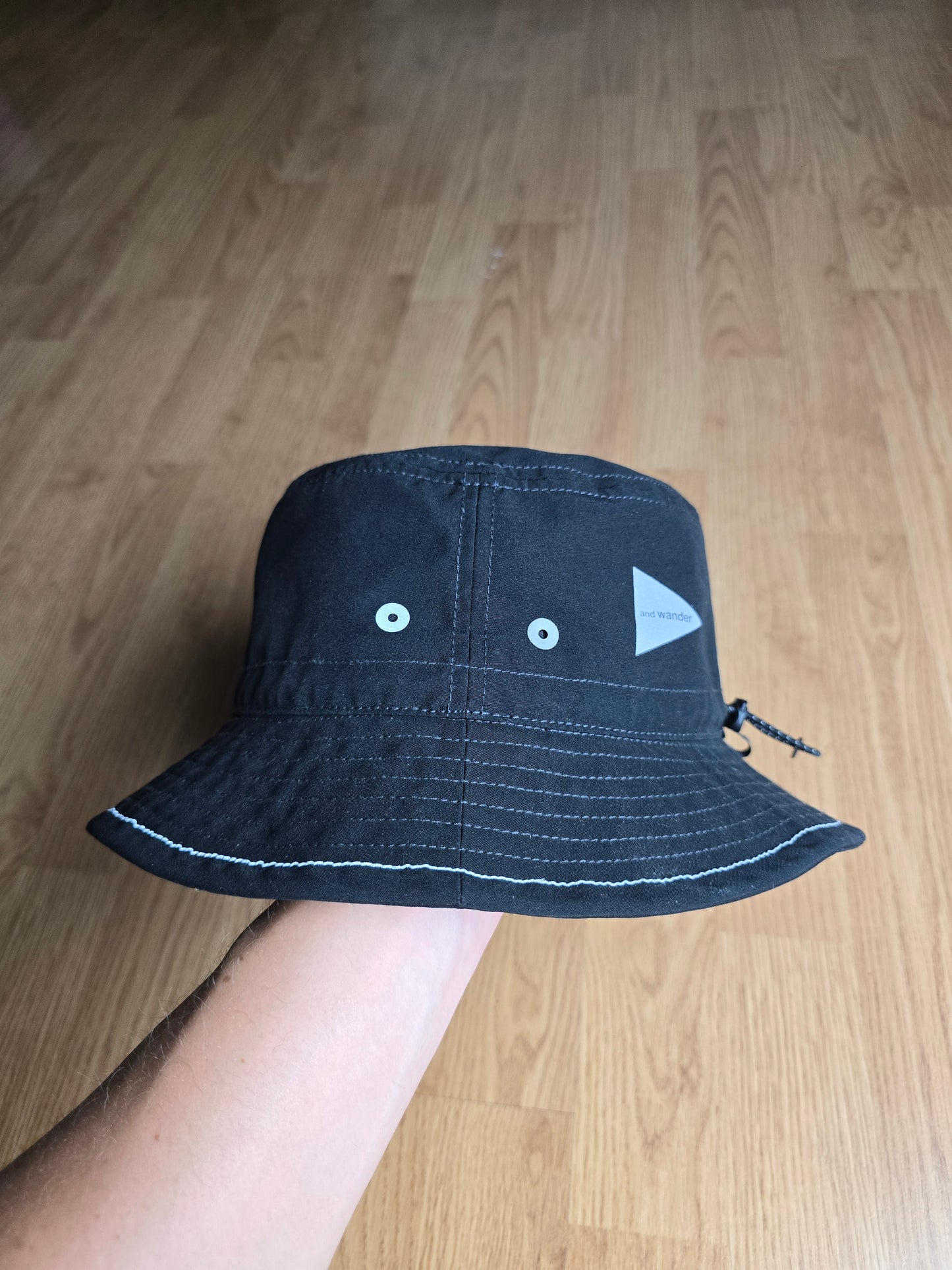 And Wander Logo Print 3M Reflective Bucket Hat