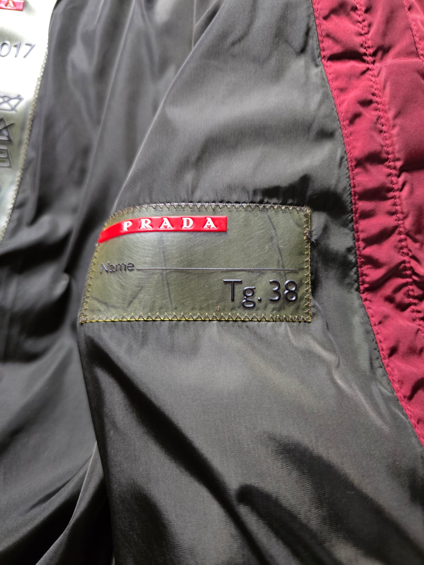 00s Prada Sport Nylon Shimmer Down Technical Toggle Puffer Jacket (S)