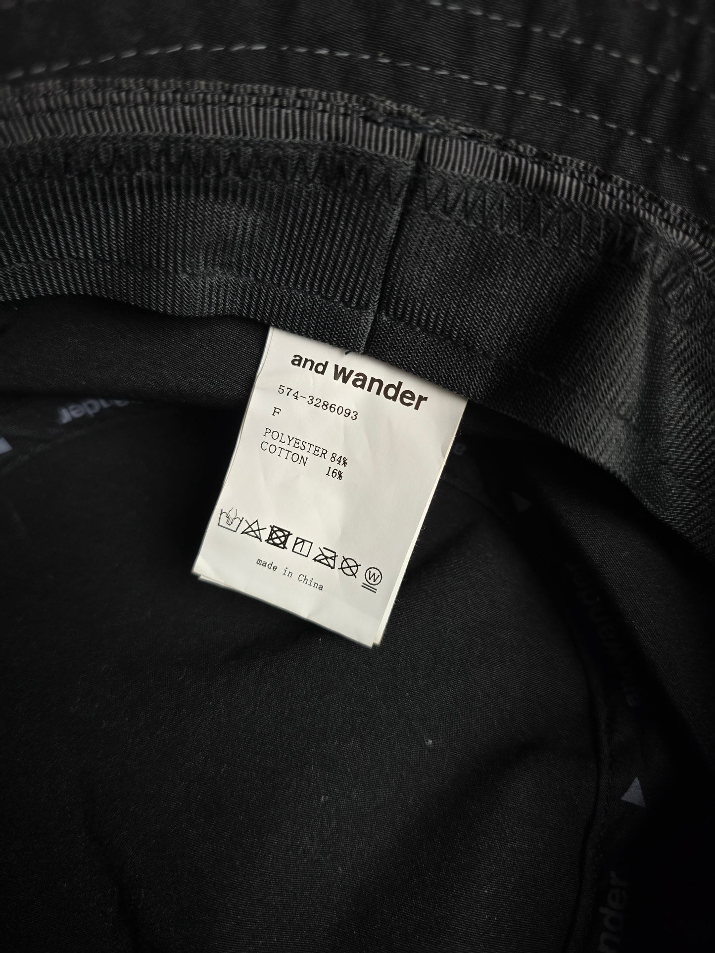 And Wander Logo Print 3M Reflective Bucket Hat