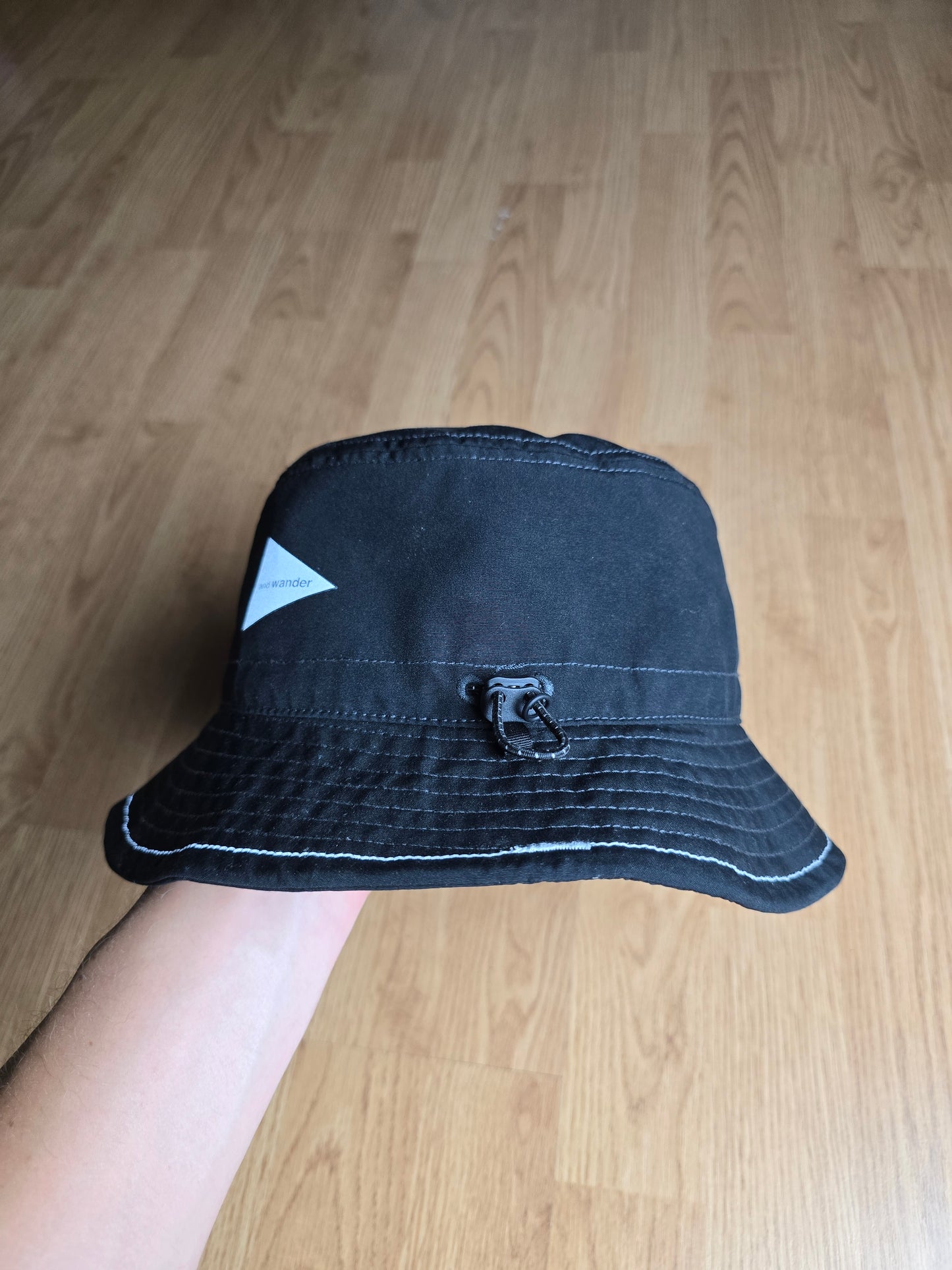 And Wander Logo Print 3M Reflective Bucket Hat